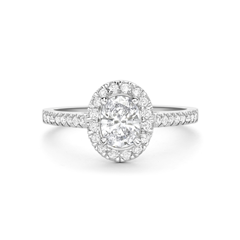 Oval cut diamond claw set halo cluster ring in platinum, 3133