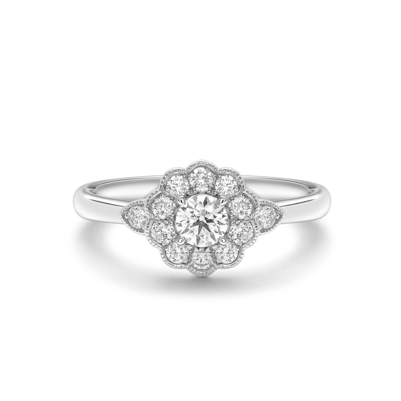 Brilliant cut diamond claw set cluster ring in platinum, 3528